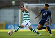 13 July 2021; Danny Mandroiu of Shamrock Rovers in action against Rafael Ratão of Slovan Bratislava during the UEFA Champions League first qualifying round second leg match between Shamrock Rovers and Slovan Bratislava at Tallaght Stadium in Dublin. Photo by Stephen McCarthy/Sportsfile