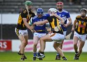 13 July 2021; Mark Hennessy of Laois is fouled by Peter McDonald, left, and Jamie Young of Kilkenny, resulting in a penalty during the Leinster U20 Hurling Championship Quarter-Final match between Kilkenny and Laois at UPMC Nowlan Park in Kilkenny. Photo by Sam Barnes/Sportsfile