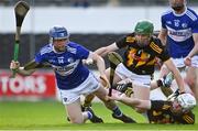 13 July 2021; Mark Hennessy of Laois attempts a shot at goal despite the efforts of Peter McDonald, left, and Jamie Young of Kilkenny during the Leinster U20 Hurling Championship Quarter-Final match between Kilkenny and Laois at UPMC Nowlan Park in Kilkenny. Photo by Sam Barnes/Sportsfile