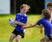 14 July 2021; Saoirse Gannon, age 8, in action during the Bank of Ireland Leinster Rugby Summer Camp at Longford RFC in Longford. Photo by Matt Browne/Sportsfile