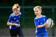 14 July 2021; Carter McCann, right, during the Bank of Ireland Leinster Rugby Summer Camp at Terenure College RFC in Dublin. Photo by Harry Murphy/Sportsfile