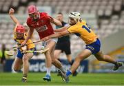 14 July 2021; Ben O’Connor of Cork is tackled by Colm Killeen, left, and Callum Hassett of Clare during the 2021 Electric Ireland Munster GAA Hurling Minor Championship Quarter-Final match between Clare and Cork at Semple Stadium in Thurles, Tipperary. Photo by Eóin Noonan/Sportsfile