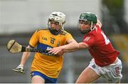 14 July 2021; Conor Whelan of Clare in action against James Byrne of Cork during the 2021 Electric Ireland Munster GAA Hurling Minor Championship Quarter-Final match between Clare and Cork at Semple Stadium in Thurles, Tipperary. Photo by Eóin Noonan/Sportsfile