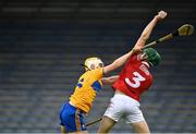 14 July 2021; Kevin Lyons of Cork catches a ball ahead of Sean Rynne of Clare during the 2021 Electric Ireland Munster GAA Hurling Minor Championship Quarter-Final match between Clare and Cork at Semple Stadium in Thurles, Tipperary. Photo by Eóin Noonan/Sportsfile