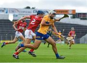 14 July 2021; Callum Hassett of Clare in action against Darragh O’Sullivan of Cork during the 2021 Electric Ireland Munster GAA Hurling Minor Championship Quarter-Final match between Clare and Cork at Semple Stadium in Thurles, Tipperary. Photo by Eóin Noonan/Sportsfile