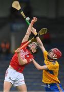 14 July 2021; Ross O’Sullivan of Cork in action against John Cahill of Clare during the 2021 Electric Ireland Munster GAA Hurling Minor Championship Quarter-Final match between Clare and Cork at Semple Stadium in Thurles, Tipperary. Photo by Eóin Noonan/Sportsfile