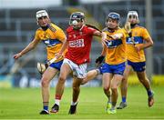 14 July 2021; Mikey Finn of Cork in action against Niall O Farrell, left, and Jack O Neill of Clare during the 2021 Electric Ireland Munster GAA Hurling Minor Championship Quarter-Final match between Clare and Cork at Semple Stadium in Thurles, Tipperary. Photo by Eóin Noonan/Sportsfile