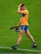 14 July 2021; Shane Woods of Clare leaves the pitch after being shown a second yellow by referee Nicky Barry during the 2021 Electric Ireland Munster GAA Hurling Minor Championship Quarter-Final match between Clare and Cork at Semple Stadium in Thurles, Tipperary. Photo by Eóin Noonan/Sportsfile