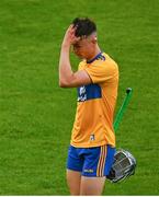 14 July 2021; Shane Woods of Clare leaves the pitch after being shown a second yellow by referee Nicky Barry during the 2021 Electric Ireland Munster GAA Hurling Minor Championship Quarter-Final match between Clare and Cork at Semple Stadium in Thurles, Tipperary. Photo by Eóin Noonan/Sportsfile