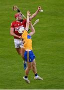 14 July 2021; Ben O’Connor of Cork in action against James Doherty of Clare during the 2021 Electric Ireland Munster GAA Hurling Minor Championship Quarter-Final match between Clare and Cork at Semple Stadium in Thurles, Tipperary. Photo by Eóin Noonan/Sportsfile