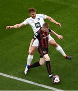 15 July 2021; Ross Tierney of Bohemians and Brynjar Gudjónsson of Stjarnan during the UEFA Europa Conference League first qualifying round second leg match between Bohemians and Stjarnan at the Aviva Stadium in Dublin. Photo by Ben McShane/Sportsfile