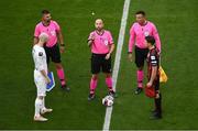15 July 2021; Referee Jason Barcelo performs the coin-toss in the company of Bohemians captain Keith Buckley, right, and Stjarnan captain Daníel Laxdal before the UEFA Europa Conference League first qualifying round second leg match between Bohemians and Stjarnan at the Aviva Stadium in Dublin. Photo by Ben McShane/Sportsfile