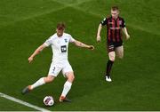 15 July 2021; Brynjar Gudjónsson of Stjarnan and Ross Tierney of Bohemians during the UEFA Europa Conference League first qualifying round second leg match between Bohemians and Stjarnan at the Aviva Stadium in Dublin. Photo by Ben McShane/Sportsfile