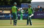 16 July 2021; South Africa batsmen Janneman Malan, left, and Quinton de Kock congratulate each other after bringing up two hundred runs for their side during the 3rd Dafanews Cup Series One Day International match between Ireland and South Africa at The Village in Malahide, Dublin. Photo by Seb Daly/Sportsfile