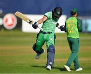 16 July 2021; Simi Singh of Ireland celebrates after bringing up his century during the 3rd Dafanews Cup Series One Day International match between Ireland and South Africa at The Village in Malahide, Dublin. Photo by Seb Daly/Sportsfile