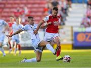 16 July 2021; Robbie Benson of St Patrick's Athletic in action against Luke Heeney of Drogheda United during the SSE Airtricity League Premier Division match between St Patrick's Athletic and Drogheda United at Richmond Park in Dublin.  Photo by Piaras Ó Mídheach/Sportsfile