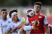 16 July 2021; James Brown of Drogheda United in action against Jay McClelland of St Patrick's Athletic during the SSE Airtricity League Premier Division match between St Patrick's Athletic and Drogheda United at Richmond Park in Dublin.  Photo by Piaras Ó Mídheach/Sportsfile