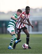 16 July 2021; Junior Ogedi-Uzokwe of Derry City in action against Ronan Finn of Shamrock Rovers during the SSE Airtricity League Premier Division match between Derry City and Shamrock Rovers at the Ryan McBride Brandywell Stadium in Derry. Photo by David Fitzgerald/Sportsfile