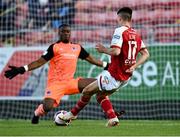 16 July 2021; Darragh Burns of St Patrick's Athletic in action against Drogheda United goalkeeper David Odumosu during the SSE Airtricity League Premier Division match between St Patrick's Athletic and Drogheda United at Richmond Park in Dublin.  Photo by Piaras Ó Mídheach/Sportsfile