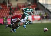 16 July 2021; Junior Ogedi-Uzokwe of Derry City in action against Ronan Finn of Shamrock Rovers during the SSE Airtricity League Premier Division match between Derry City and Shamrock Rovers at the Ryan McBride Brandywell Stadium in Derry. Photo by David Fitzgerald/Sportsfile