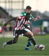 16 July 2021; Junior Ogedi-Uzokwe of Derry City in action against Ronan Finn of Shamrock Rovers during the SSE Airtricity League Premier Division match between Derry City and Shamrock Rovers at the Ryan McBride Brandywell Stadium in Derry. Photo by David Fitzgerald/Sportsfile