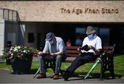 17 July 2021; Racegoers Chris Martin, left, and Mick Dunne from New Ross, Co Wexford inspect the racecard prior to racing at The Curragh Racecourse in Kildare. Photo by David Fitzgerald/Sportsfile