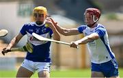 17 July 2021; Charles Dwyer of Laois in action against Calum Lyons of Waterford during the GAA Hurling All-Ireland Senior Championship Round 1 match between Laois and Waterford at UPMC Nowlan Park in Kilkenny. Photo by Harry Murphy/Sportsfile