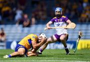 17 July 2021; Aron Shanagher of Clare goes down with an injury, before being awarded a free, during the GAA Hurling All-Ireland Senior Championship Round 1 match between Clare and Wexford at Semple Stadium in Thurles, Tipperary. Photo by Piaras Ó Mídheach/Sportsfile