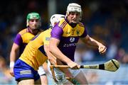 17 July 2021; Liam Ryan of Wexford in action against Aron Shanagher of Clare during the GAA Hurling All-Ireland Senior Championship Round 1 match between Clare and Wexford at Semple Stadium in Thurles, Tipperary. Photo by Piaras Ó Mídheach/Sportsfile