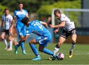 17 July 2021; David McMillan of Dundalk in action against Will Seymore of Finn Harps during the SSE Airtricity League Premier Division match between Dundalk and Finn Harps at Oriel Park in Dundalk, Louth. Photo by Michael P Ryan/Sportsfile