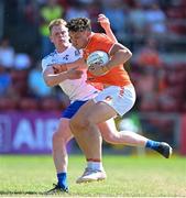 17 July 2021; James Morgan of Armagh is tackled by Ryan McAnespie of Monaghan during the Ulster GAA Football Senior Championship Semi-Final match between Armagh and Monaghan at Páirc Esler in Newry, Down. Photo by Ramsey Cardy/Sportsfile