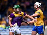 17 July 2021; Conor Cleary of Clare pulls the jersey of Conor McDonald of Wexford during the GAA Hurling All-Ireland Senior Championship Round 1 match between Clare and Wexford at Semple Stadium in Thurles, Tipperary. Photo by Piaras Ó Mídheach/Sportsfile