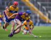 17 July 2021; Shane Reck of Wexford in action against John Conlon of Clare during the GAA Hurling All-Ireland Senior Championship Round 1 match between Clare and Wexford at Semple Stadium in Thurles, Tipperary. Photo by Piaras Ó Mídheach/Sportsfile