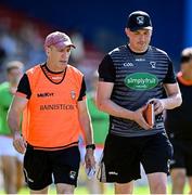 17 July 2021; Armagh manager Kieran McGeeney, left, and selector Kieran Donaghy during the Ulster GAA Football Senior Championship Semi-Final match between Armagh and Monaghan at Páirc Esler in Newry, Down. Photo by Ramsey Cardy/Sportsfile