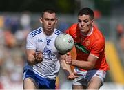 17 July 2021; Michael Bannigan of Monaghan in action against Jarly Óg Burns of Armagh during the Ulster GAA Football Senior Championship Semi-Final match between Armagh and Monaghan at Páirc Esler in Newry, Down. Photo by Sam Barnes/Sportsfile
