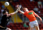 17 July 2021; Conor Turbitt of Armagh scores his side's first goal despite the efforts of Monaghan goalkeeper Rory Beggan during the Ulster GAA Football Senior Championship Semi-Final match between Armagh and Monaghan at Páirc Esler in Newry, Down. Photo by Ramsey Cardy/Sportsfile