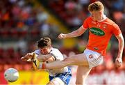 17 July 2021; Conor Turbitt of Armagh has a shot blocked by Darren Hughes of Monaghan during the Ulster GAA Football Senior Championship Semi-Final match between Armagh and Monaghan at Páirc Esler in Newry, Down. Photo by Ramsey Cardy/Sportsfile