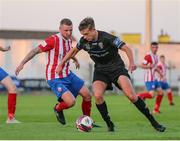 16 July 2021; Evan Caffrey of UCD in action against Anthony O'Donnell of Treaty United during the SSE Airtricity League First Division match between Treaty United and UCD at Market's Field in Limerick. Photo by Michael P Ryan/Sportsfile