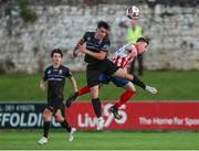16 July 2021; Liam Kerrigan of UCD in action against Edward McCarthy of Treaty United during the SSE Airtricity League First Division match between Treaty United and UCD at Market's Field in Limerick. Photo by Michael P Ryan/Sportsfile