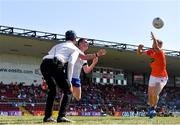 17 July 2021; Killian Lavelle of Monaghan in action against Oisin O'Neill of Armagh during the Ulster GAA Football Senior Championship Semi-Final match between Armagh and Monaghan at Páirc Esler in Newry, Down. Photo by Ramsey Cardy/Sportsfile
