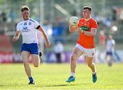 17 July 2021; Tiernan Kelly of Armagh in action against Andrew Woods of Monaghan during the Ulster GAA Football Senior Championship Semi-Final match between Armagh and Monaghan at Páirc Esler in Newry, Down. Photo by Ramsey Cardy/Sportsfile