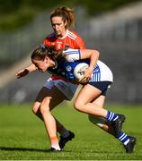 17 July 2021; Neasa Byrd of Cavan and Caroline O Hanlon of Armagh during the TG4 All-Ireland Senior Ladies Football Championship Group 2 Round 2 match between Armagh and Cavan at St Tiernach's Park in Monaghan. Photo by Ben McShane/Sportsfile