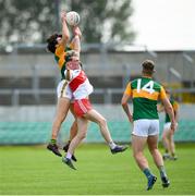 18 July 2021; Paudie O'Leary of Kerry in action against Lee Brady of Derry during the 2020 Electric Ireland GAA Football All-Ireland Minor Championship Final match between Derry and Kerry at Bord Na Mona O’Connor Park in Tullamore. Photo by Matt Browne/Sportsfile