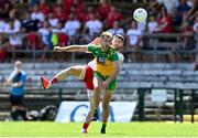 18 July 2021; Stephen McMenamin of Donegal in action against Matthew Donnelly of Tyrone during the Ulster GAA Football Senior Championship Semi-Final match between Donegal and Tyrone at Brewster Park in Enniskillen, Fermanagh. Photo by Sam Barnes/Sportsfile