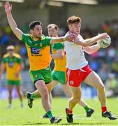 18 July 2021; Conor Meyler of Tyrone in action against Ryan McHugh of Donegal during the Ulster GAA Football Senior Championship Semi-Final match between Donegal and Tyrone at Brewster Park in Enniskillen, Fermanagh. Photo by Sam Barnes/Sportsfile