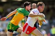 18 July 2021; Kieran McGeary of Tyrone in action against Ryan McHugh of Donegal during the Ulster GAA Football Senior Championship Semi-Final match between Donegal and Tyrone at Brewster Park in Enniskillen, Fermanagh. Photo by Sam Barnes/Sportsfile