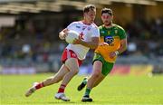 18 July 2021; Kieran McGeary of Tyrone in action against Ryan McHugh of Donegal during the Ulster GAA Football Senior Championship Semi-Final match between Donegal and Tyrone at Brewster Park in Enniskillen, Fermanagh. Photo by Sam Barnes/Sportsfile
