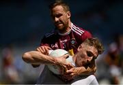 18 July 2021; Daniel Flynn of Kildare is tackled by Kevin Maguire of Westmeath during the Leinster GAA Senior Football Championship Semi-Final match between Kildare and Westmeath at Croke Park in Dublin. Photo by Harry Murphy/Sportsfile