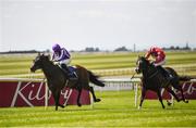 18 July 2021; Order of Australia, with Ryan Moore up, left, on their way to winning the Romanised Minstrel Stakes ahead of eventual second place Njord, with Tom Madden up, at The Curragh Racecourse in Kildare. Photo by David Fitzgerald/Sportsfile