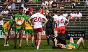 18 July 2021; Rory Brennan, second from right, of Tyrone receives a black card from referee Joe McQuillan during the Ulster GAA Football Senior Championship Semi-Final match between Donegal and Tyrone at Brewster Park in Enniskillen, Fermanagh. Photo by Ben McShane/Sportsfile